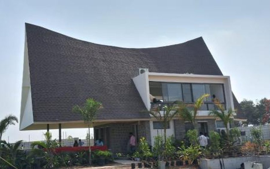 Completed villa with curved roof